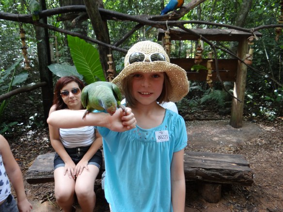 MAdie with Green Parrot